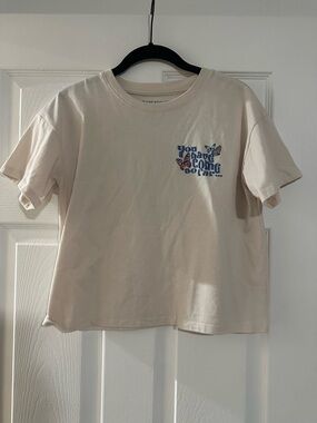 Cream Kids Short Sleeve Tee with Blue Butterfly Graphic EUC